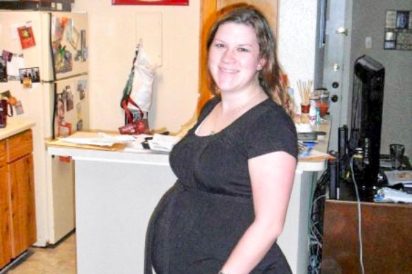 young woman pregnant with first baby with depression