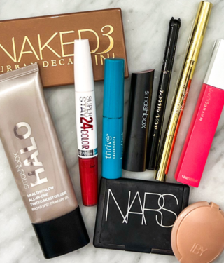 Pictured Low-Maintenance Makeup For Moms: Urban Decay Naked 3, Smashbox Halo, Maybelline SuperStay Lipstick, Nars Blush, IBY Highlighter, and Winky Lux eyebrow pencil
