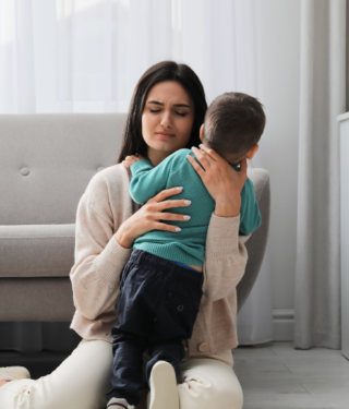 Mom With Depression hugging toddler